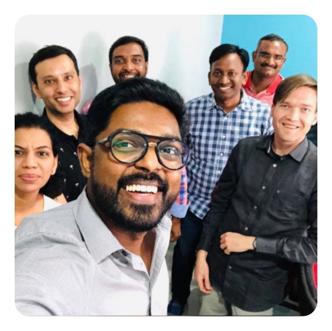 Mani Karthik with the BackToIndia community and an NPR reporter at a meetup in Hyderabad